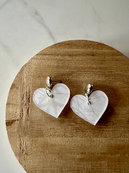 white heart dangle earrings