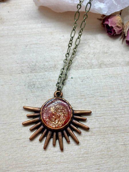 sun inspired bronze polymer clay necklace