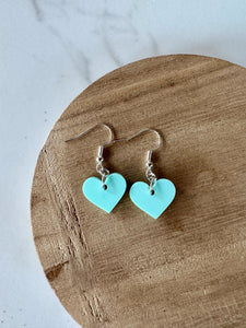 green heart dangle earrings