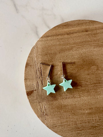 green star dangle earrings