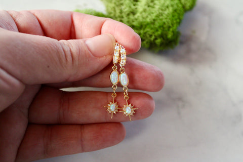 gold opal starburst huggie earrings