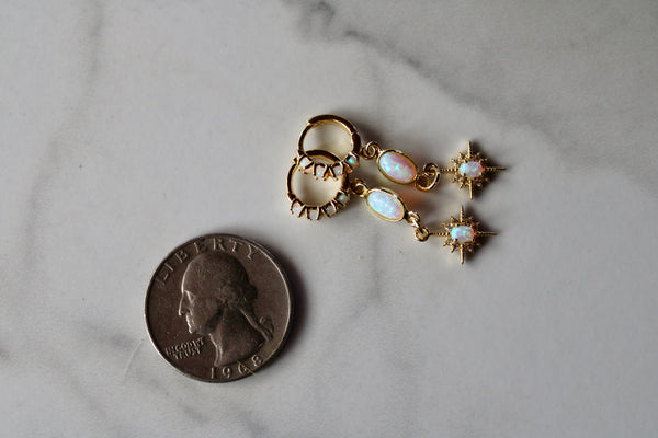 gold opal starburst huggie earrings