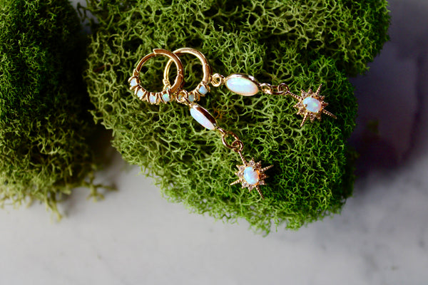 gold opal starburst huggie earrings