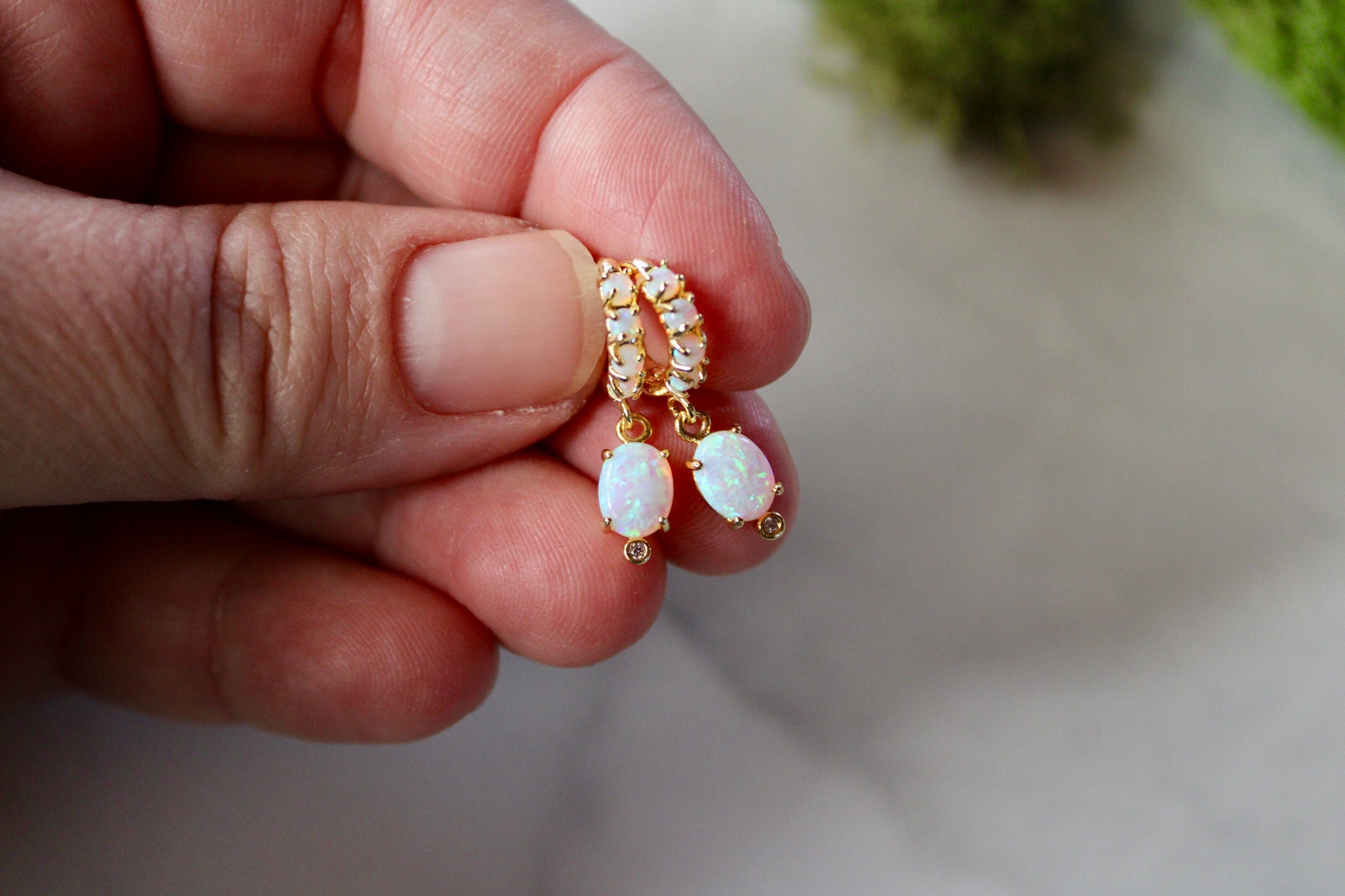 gold opal huggie earrings