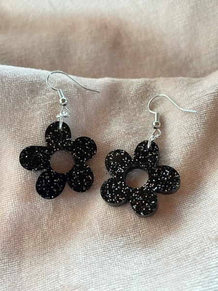small black glitter acrylic daisy dangle earrings