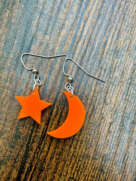 fluorescent orange moon and star earrings